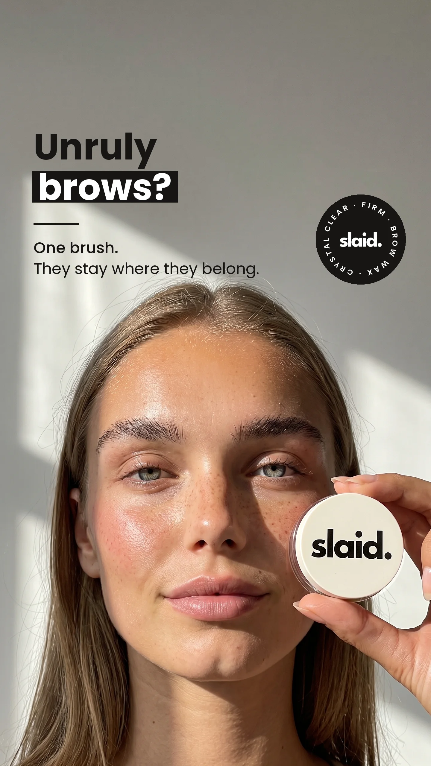 Story ad for slaid. brow wax: Unruly brows? One brush. They stay where they belong.